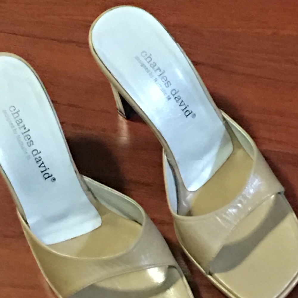 Charles Dani’s beige heels